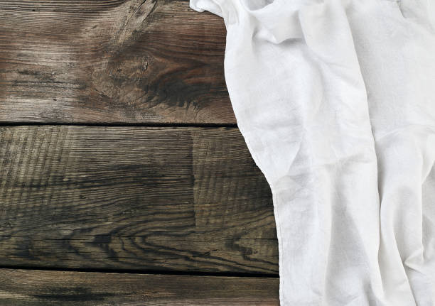 istock white gray kitchen textile towel folded on a gray wooden table from old boards 1197753135