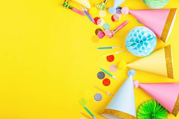 istock Birthday decor on yellow background, top view. Flat lay style. Mockup, template 1197753544