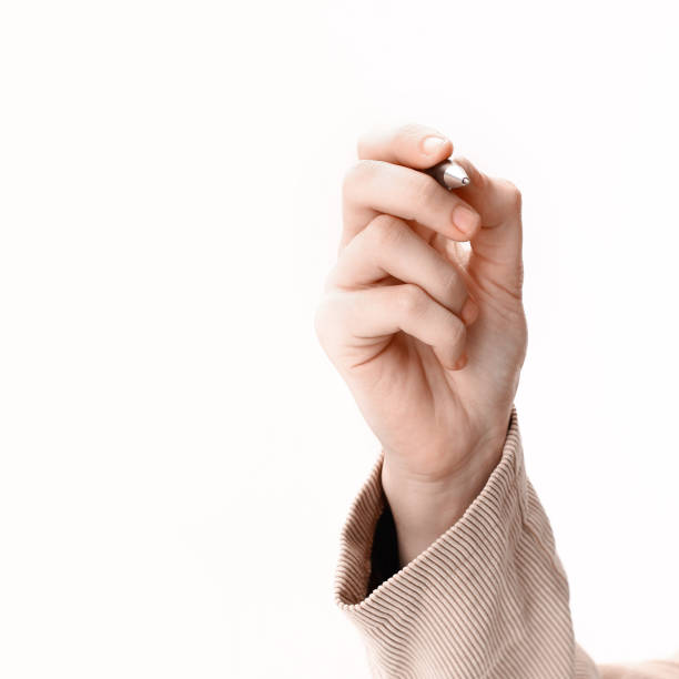 istock closeup . businessman showing a pen on a virtual point.isolated 1197755207
