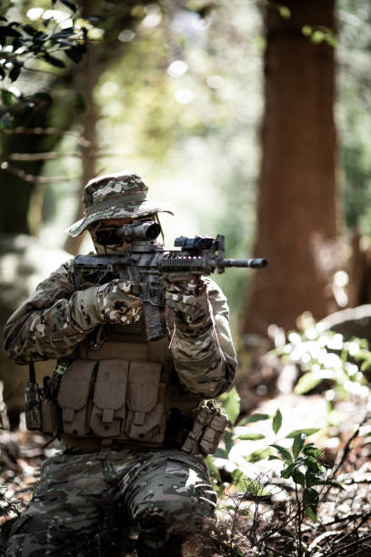 istock Tactical jungle Military hunter camouflaged 1197769346
