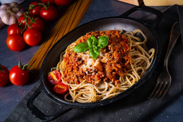 istock wholegrain spaghetti with tomato sauce and minced meat 1197770676