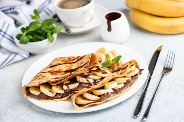 istock French crepes with chocolate spread and banana 1197774814