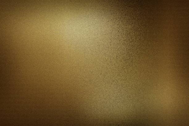 istock Dark brown foil metallic wall in dark room, abstract texture background 1197780211