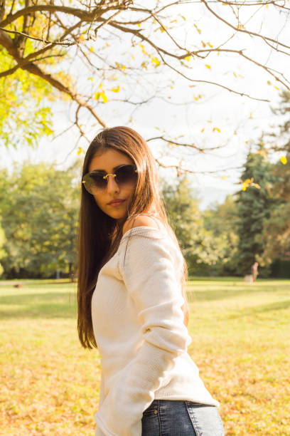 istock Fall portrait woman in the park 1197796179