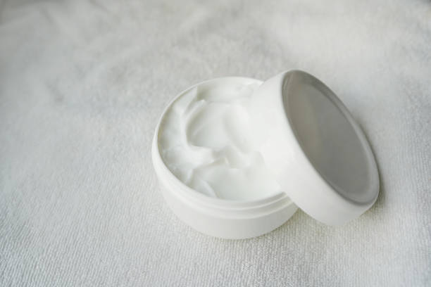 istock opened face cream container isolated on white background with a copy space 1197797338