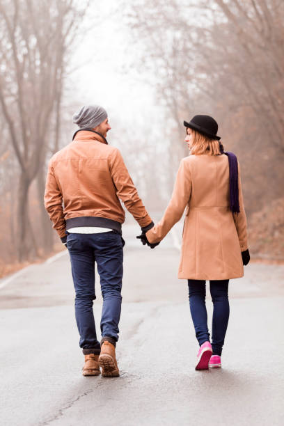 istock Couple enjoying outdoors in cold autumn / winter time. 1197798604