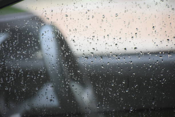 istock Water droplets in the car window 1197800528