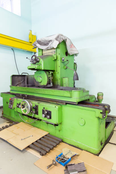 istock Old screw cutting lathe at engineering plant 1197802217