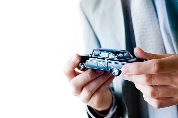 istock Man with toy cars. 119780263