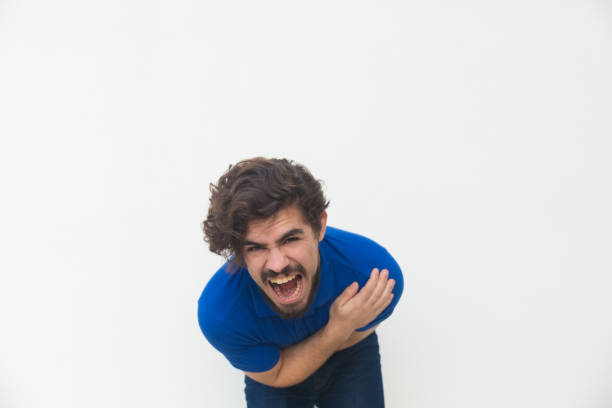 istock Frustrated unhappy guy screaming with pain 1197803460