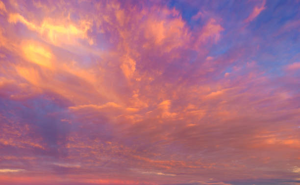 istock beautifully lit clouds during sunrise 1197803468