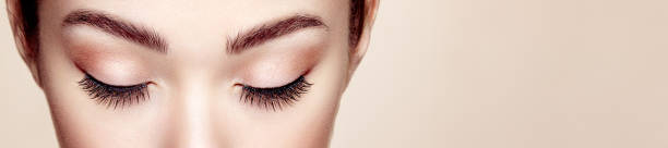 istock Female eye with long false eyelashes 1197806320