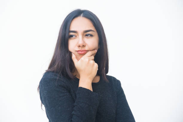 istock Serious pensive female customer touching cheeks 1197806933