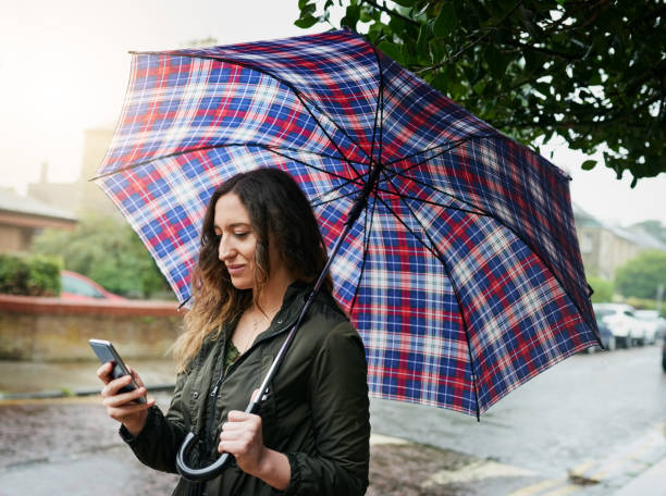 istock Checking her mobile GPS for the quickest route to take 1197807106