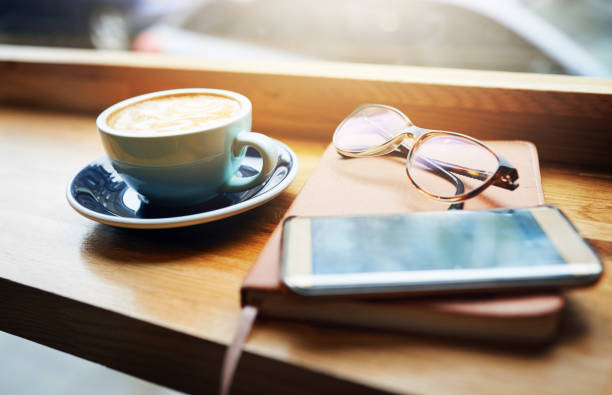 Shot of objects on a table in a cafe