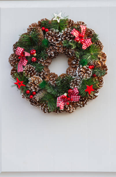 istock CChristmas wreath on a white door 1197812126