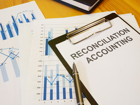 Text sign showing hand written words reconciliation accounting