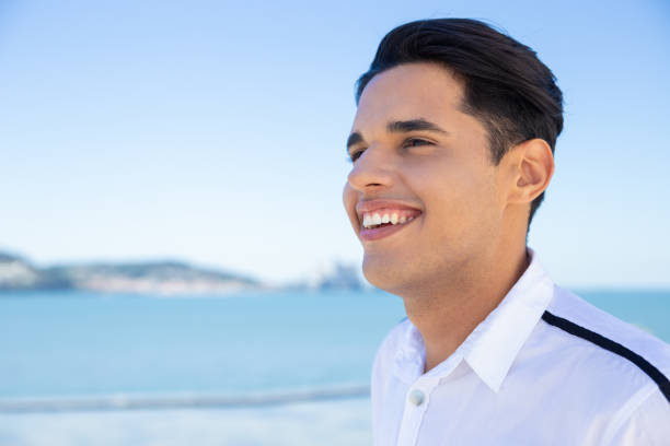 istock Happy young man looking at distance 1197816673