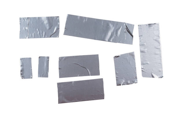 istock Silver scotch tape pieces isolated on white background. 1197817638