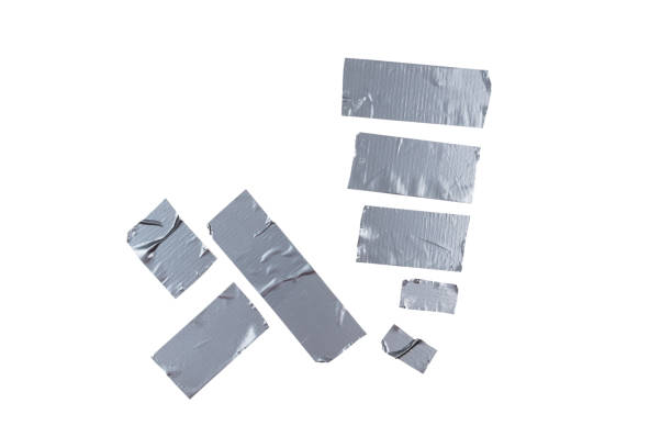 istock Silver scotch tape pieces isolated on white background. 1197817642