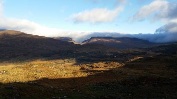 istock Irish mountain and sky landscape 1197820501