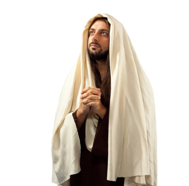 istock Man Wearing Jesus Costume Standing Against White Background 1197821580