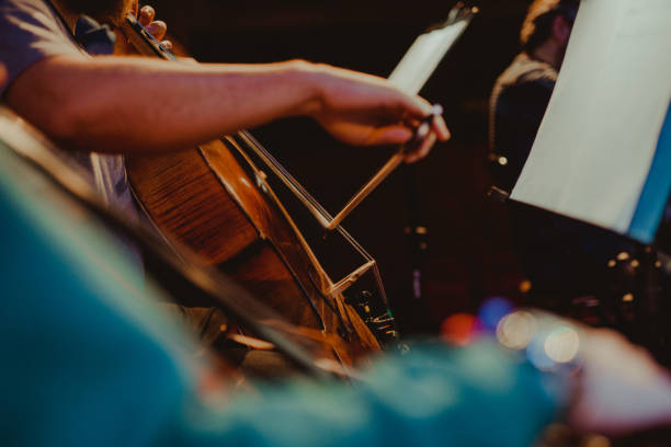 istock Midsection Of Man Playing Cello 1197823866