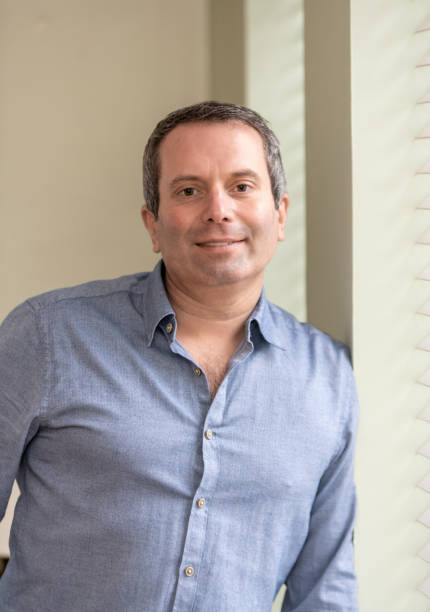 istock Man in his 40's at home 1197825389