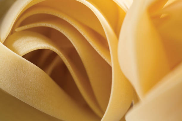 nidi pappardelle - pasta di gragnano - bronze die - italian food specialty - pasta whole wheat spaghetti raw foto e immagini stock