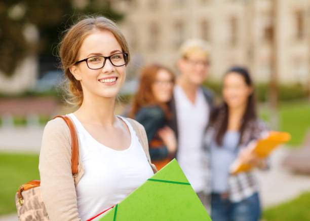 Girls studying and having fun, doing homework, back to school