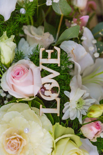 istock inscription love tops spring flowers. 1197829132