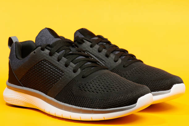 istock Pair of modern black running shoes 1197829227