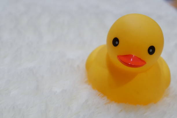 istock Rubber duck toy on white background 1197831530