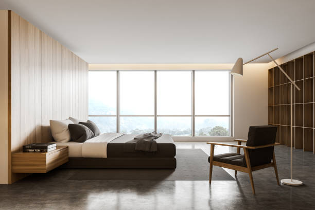 istock Side view of master bedroom with bookshelves 1197831753