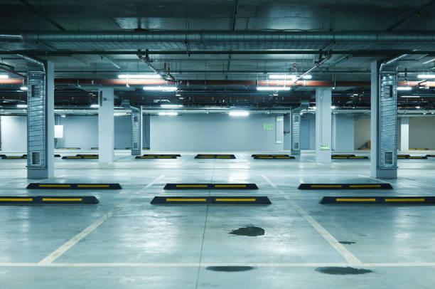 istock Horizontal image of empty underground parking lot 1197831808
