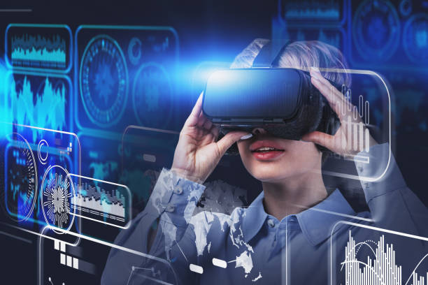 istock Woman in VR glasses, digital interface 1197833207