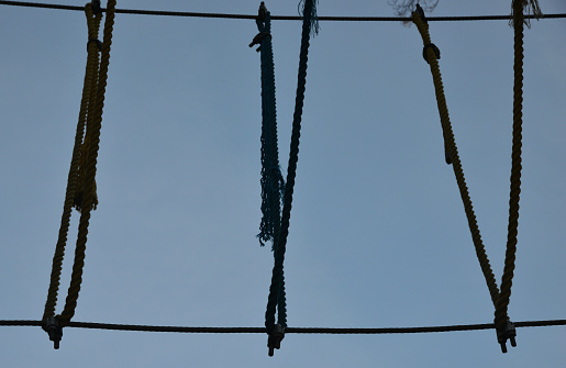 silhouette of rope in the sky on background