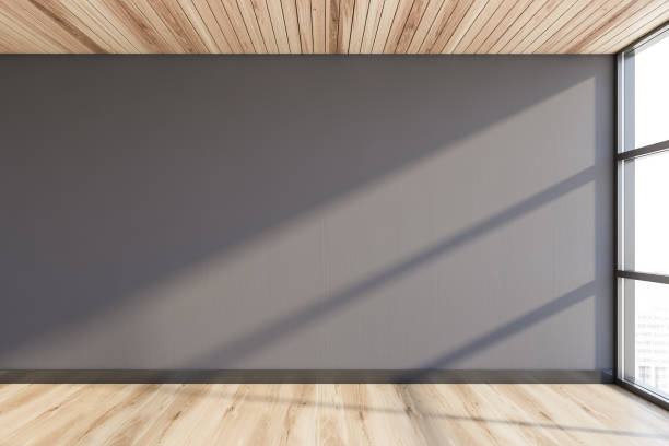 istock Empty gray room with wooden floor 1197833608