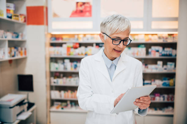 istock Portrait of a mature pharmacist using tablet 1197837432