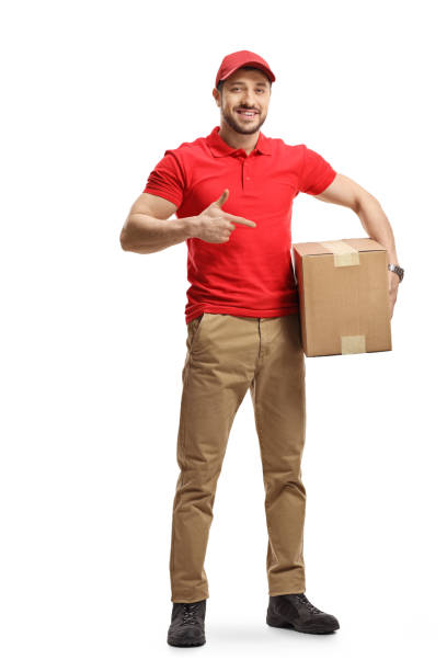 istock Delivery guy pointing to a box 1197837787