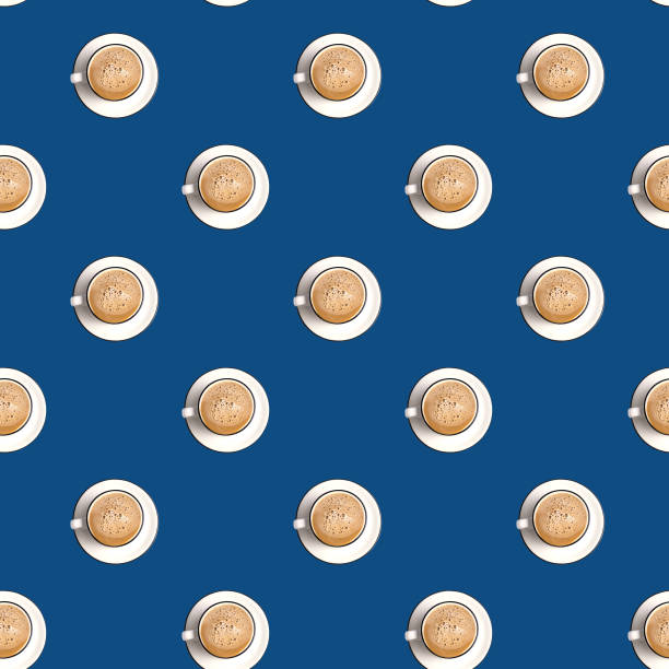 Flat lay Seamless Pattern made with latte coffee cup over classic blue color background - trend of 2020 year.