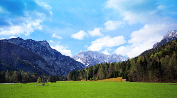 Blue and cloudy sky above Slovenian Alps stock photo