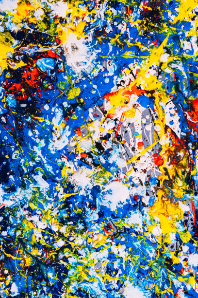 istock abstract expressionism. Picture painted using the technique of dripping. Mixing different colors red yellow blue white black. Vertical orientation. 1197840041