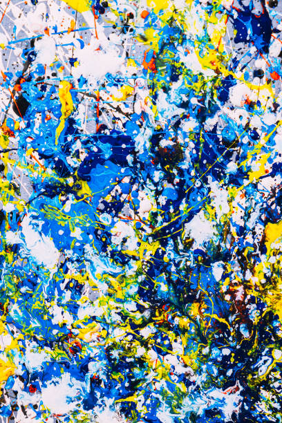 istock abstract expressionism. Picture painted using the technique of dripping. Mixing different colors red yellow blue white black. Vertical orientation. 1197840131