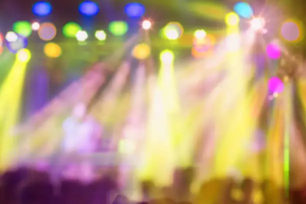 Photo of Blurry night club people enjoy of music dancing sound.Abstract Background.