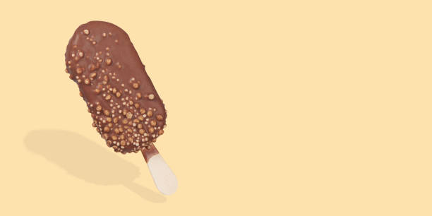 istock Brown chocolate ice cream bar popsicle with nuts 1197840902