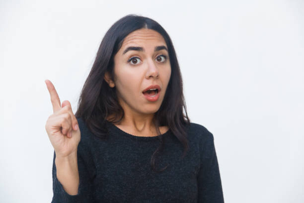 istock Surprised woman excited with new idea 1197841459