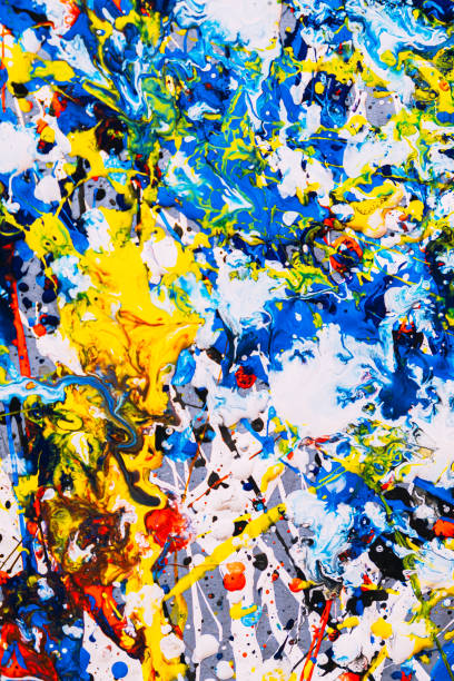 istock abstract expressonism. Picture painted using the technique of dripping. Mixing different colors red yellow blue white black. Vertcal orientation. 1197843389
