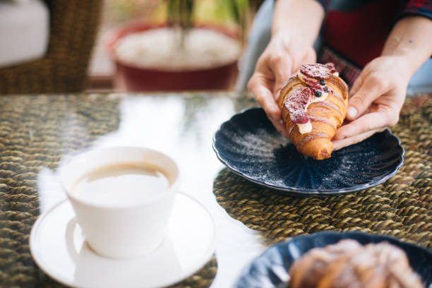 istock Croissant with berries and coffee 1197843390