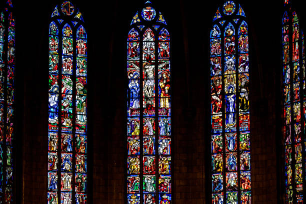 Interior view without people of the majestic and bright architecture of Saint Jean Baptiste cathedral monument in Lyon old town, also called Vieux Lyon in french. Photo taken in Lyon famous city, Unesco World Heritage Site, in Rhone department, Auvergne-Rhone-Alpes region in France, Europe during a sunny summer day.